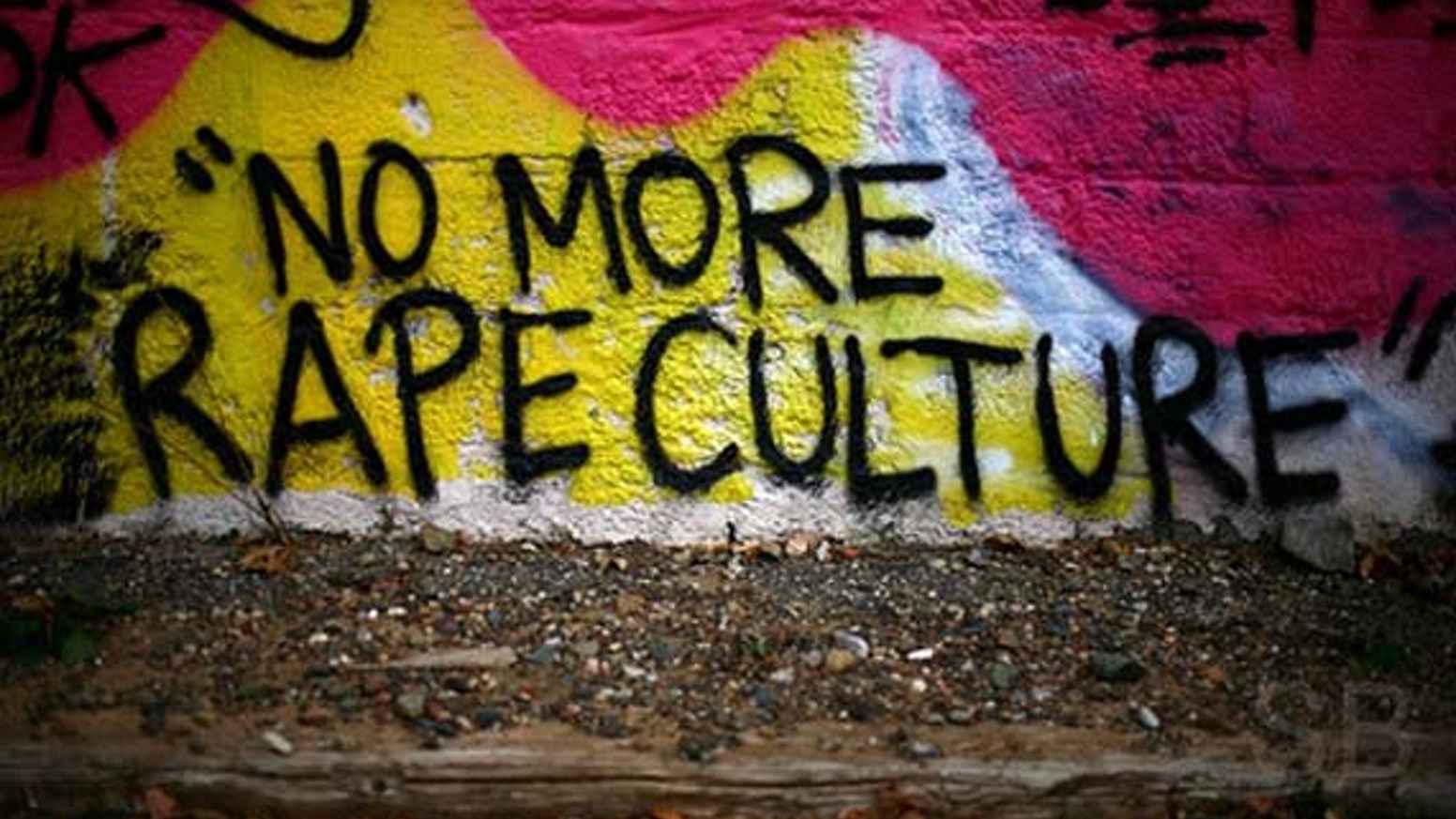 graffiti in a wall writes "no more rape culture"