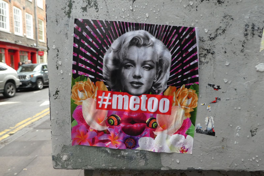 poster stuck to the wall, showing Meryl Monroe and writing #metoo