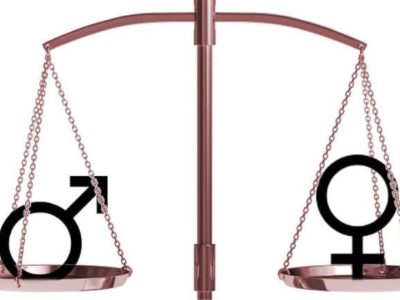 το αρσενικό και θηλυκό σύμβολο πάνω σε μια ζυγαριά που ισορροπεί